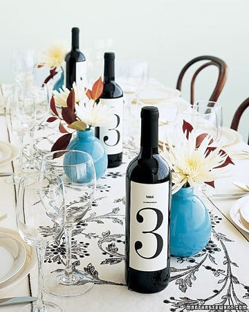customized wedding wine labels as table numbers at your wedding