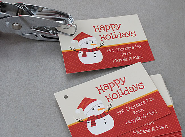 Example of how to punch the hole in your custom gift tag sticker.
