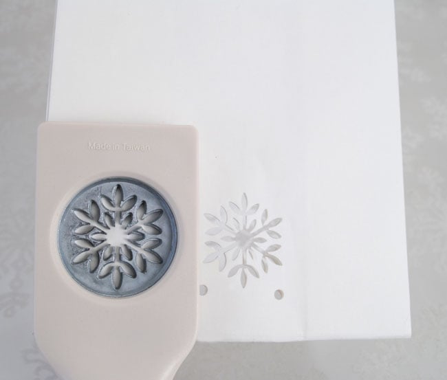 Add Snowflake punch holes after the ribbon punch holes.
