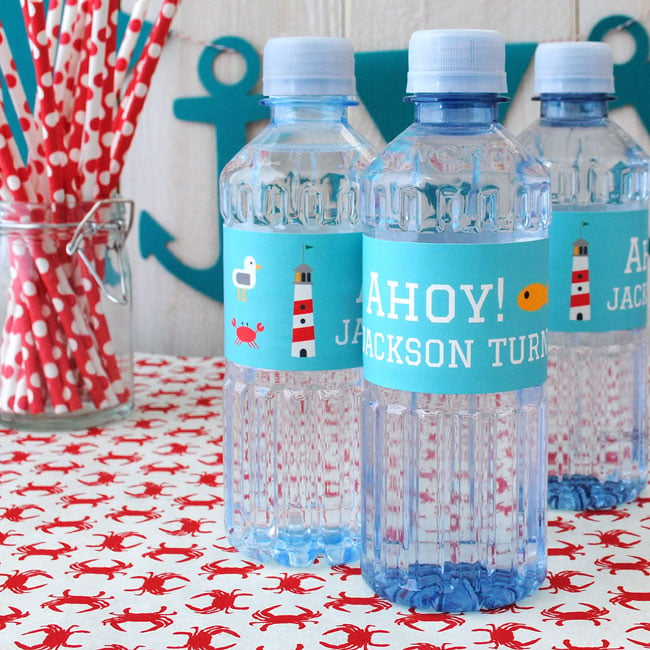 Water bottle labels with a nautical theme.