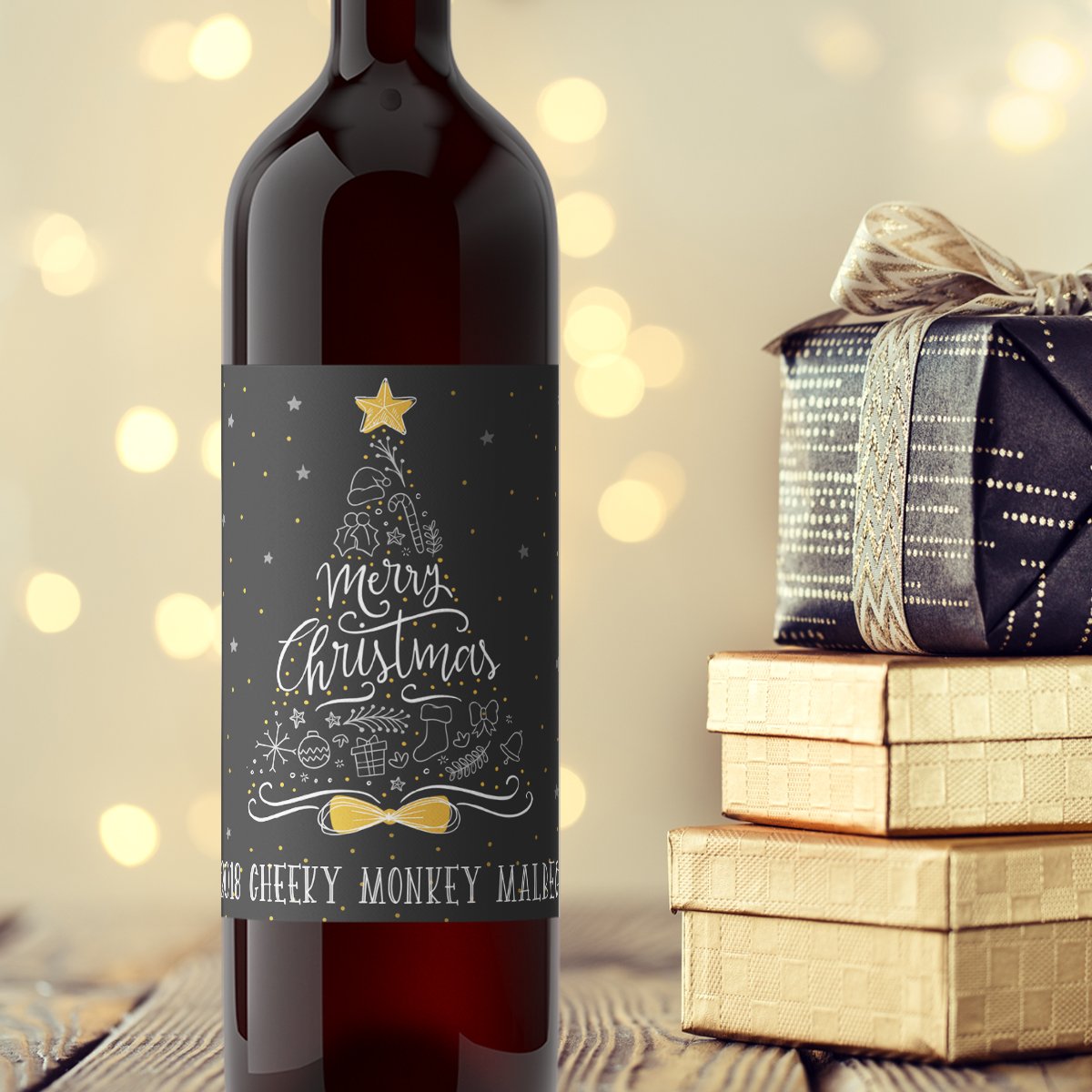 Christmas wine label with gold and white Christmas tree. Add your information uisng the online designer.
