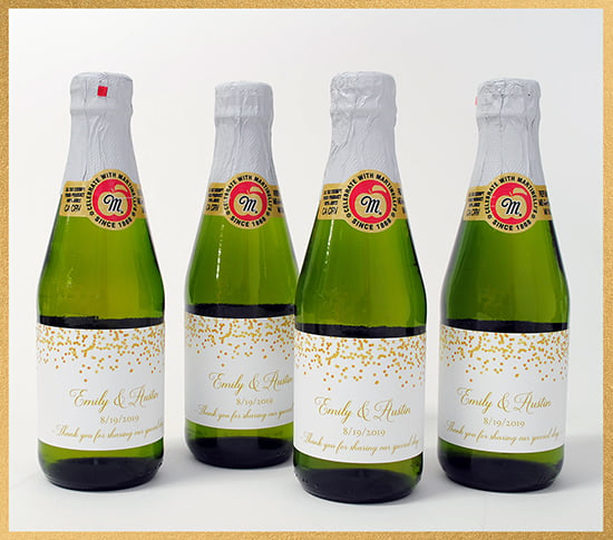 Mini sparkling cider bottles with custom party favor labels. Make your custom labels online.