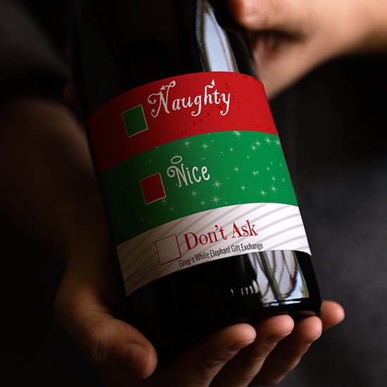 Add a funny personalized holiday wine label to a bottle of wine for a unique White Elephant gift exchange.