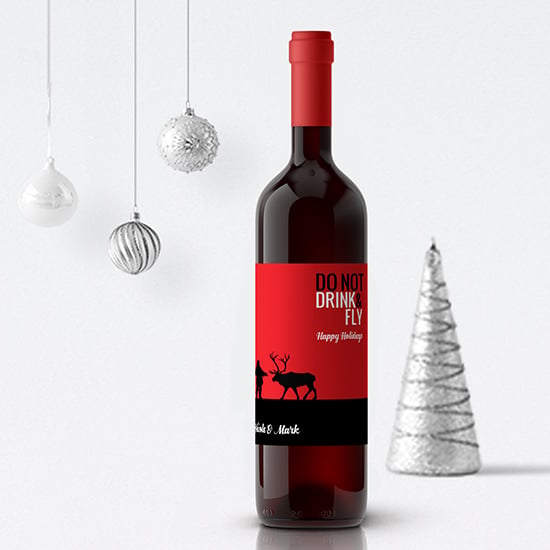 Not tacky, but funny, personalize holiday wine labels make perfect gifts at low cost.