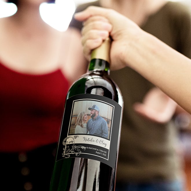 Photo wine label for an engagement announcement made from a pre-designed template. 
