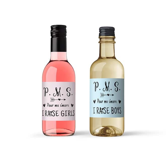 Mini wine labels with mom-life sayings. A mini Rosé bottle with the saying P.M.S. Pour me s'more, I raise girls and a mini white wine label with P.M.S. Pour me s'more, I raise boys.