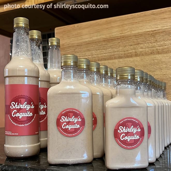 An example of custom Coquito labels on bottles of the famous Puerto Rican creamy egg drink.